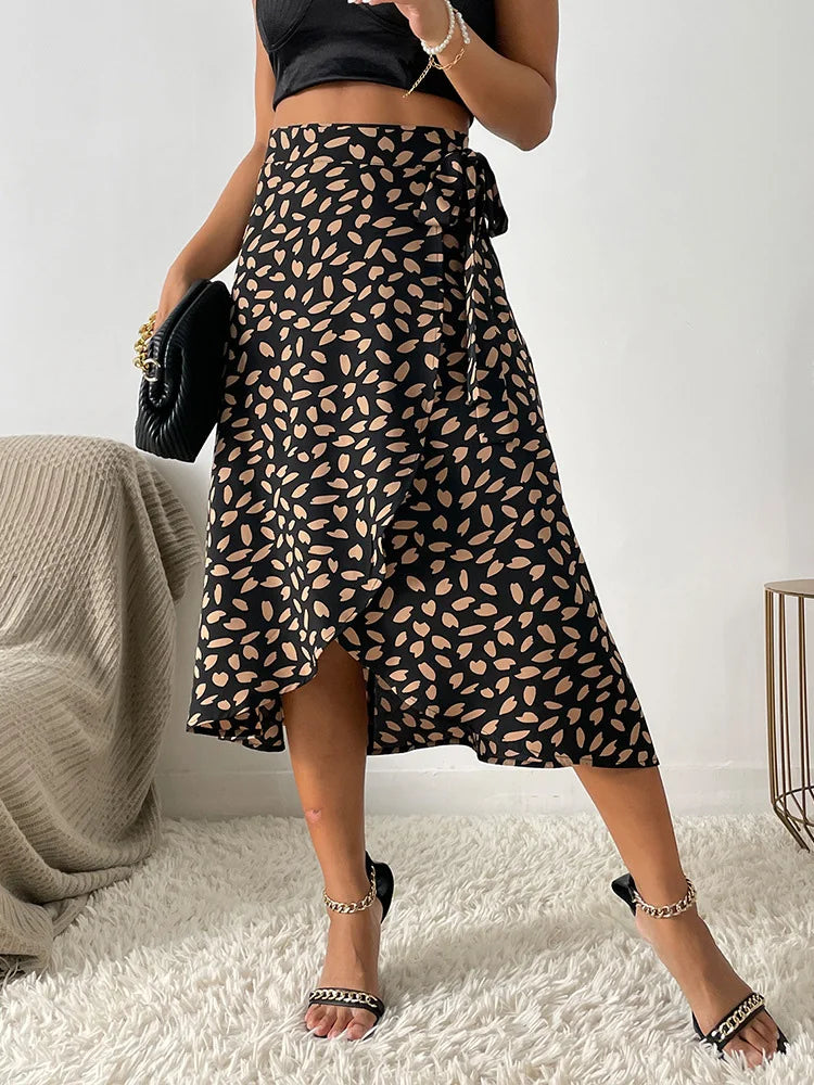 Benuynffy Boho Donna Casual Stampa Cravatta Gonna a portafoglio laterale Elegante vita alta Donna Estate Asimmetrico Lunghezza al ginocchio Gonne a trapezio