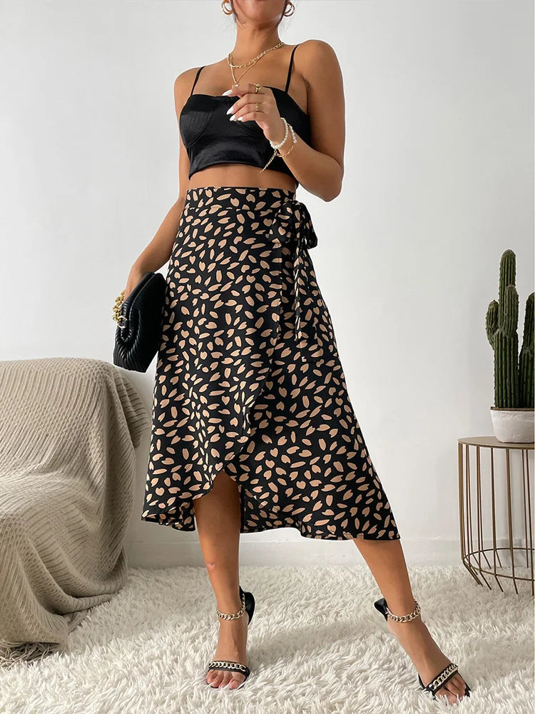 Benuynffy Boho Donna Casual Stampa Cravatta Gonna a portafoglio laterale Elegante vita alta Donna Estate Asimmetrico Lunghezza al ginocchio Gonne a trapezio